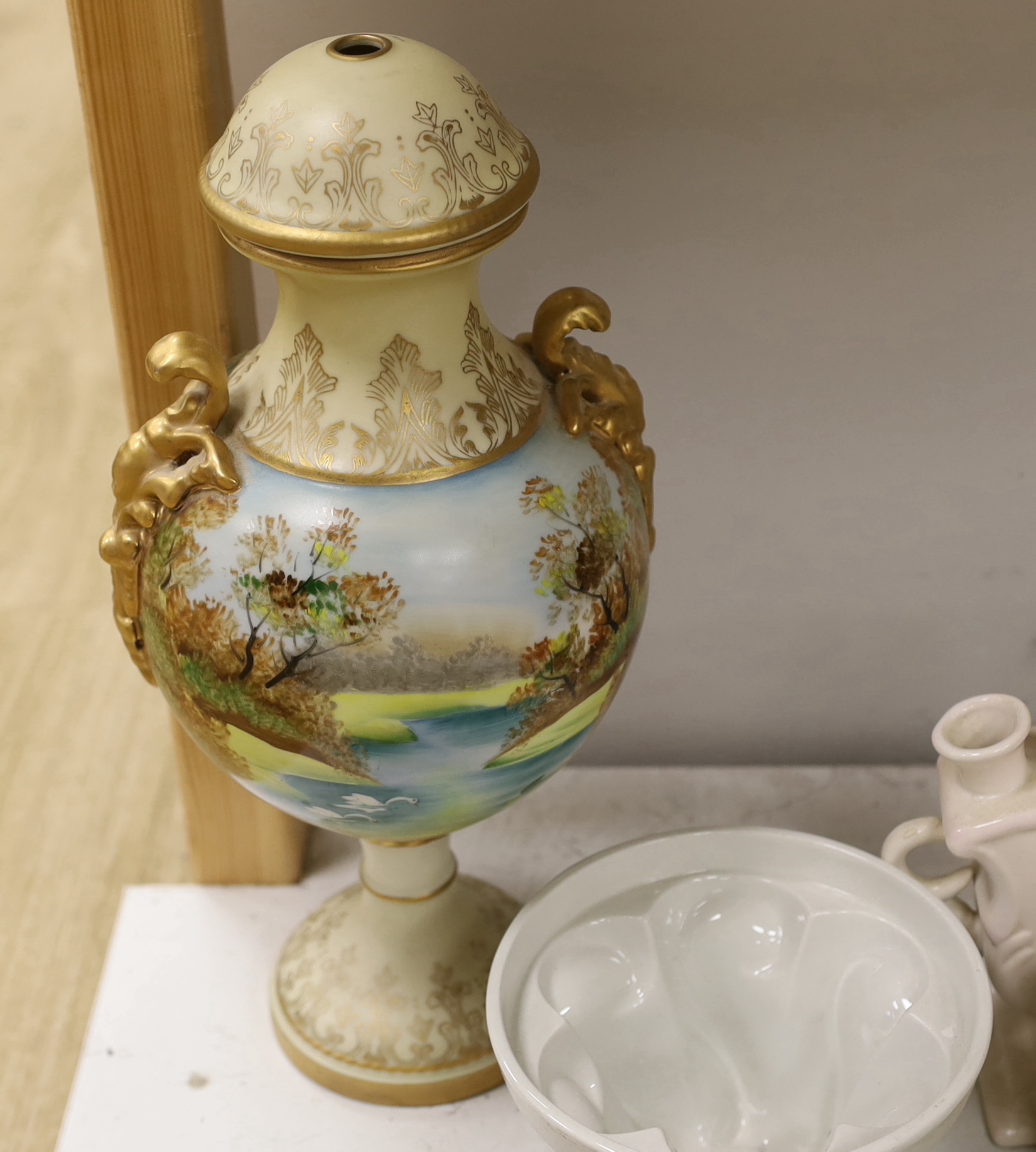 A large pottery tureen and cover, a large centrepiece and mixed ceramics including meat platters
